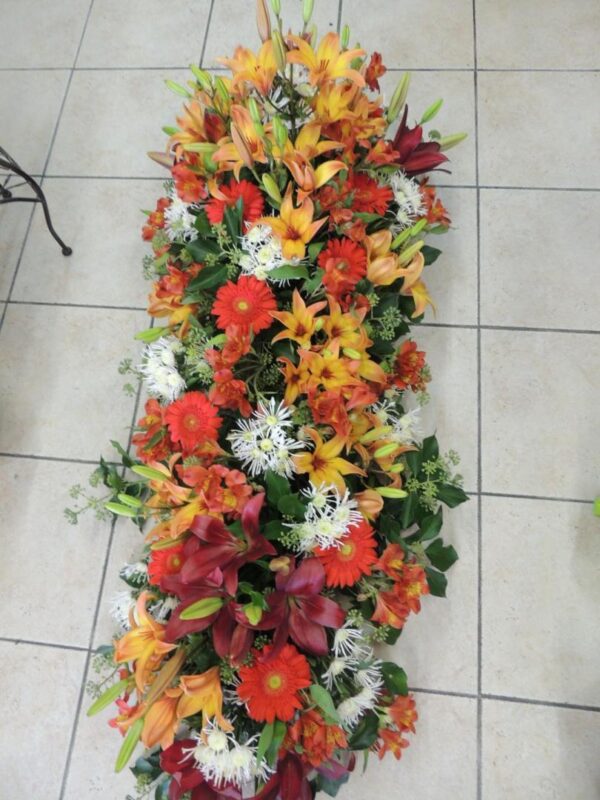 Fleurs de deuil - dessus de cercueil à Saujon
