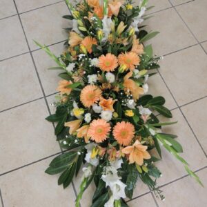 Fleurs de deuil - dessus de cercueil à Saujon
